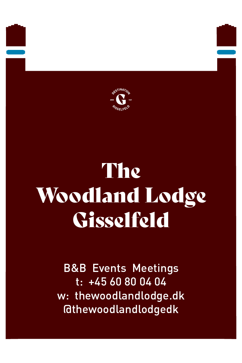 The Woodland Lodge på skilt i Destination Gisselfeld